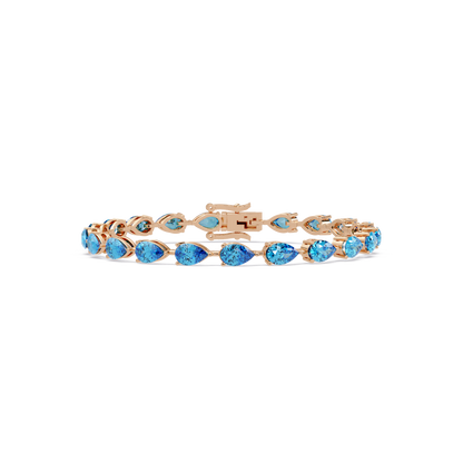 Pear-cut aquamarine blue colorstone tennis bracelet in rose gold
