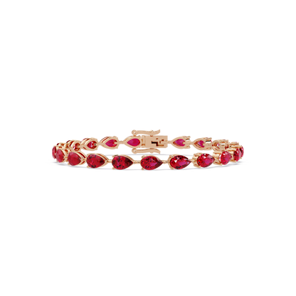 Pear-cut ruby red colorstone tennis bracelet in rose gold