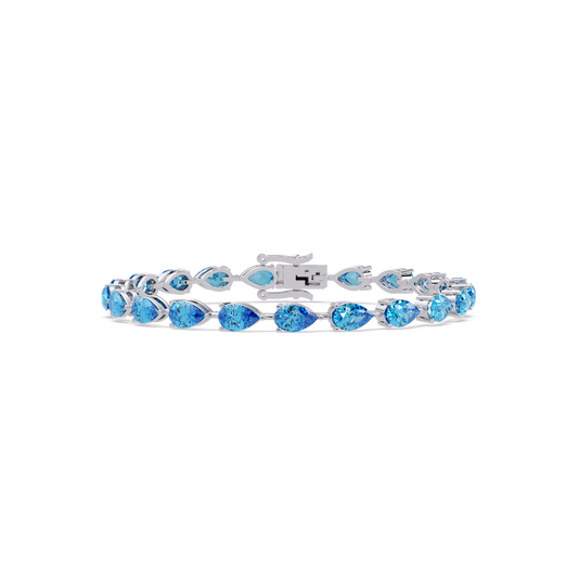 Pear-cut aquamarine blue colorstone tennis bracelet in white gold