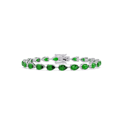 Pear-cut emerald green colorstone tennis bracelet in white gold
