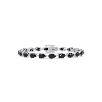 Pear-cut onyx colorstone tennis bracelet in white gold