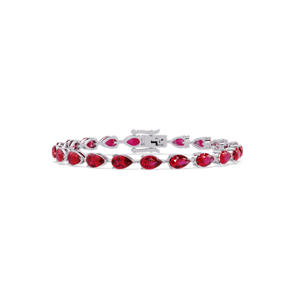 Pear-cut ruby red colorstone tennis bracelet in white gold