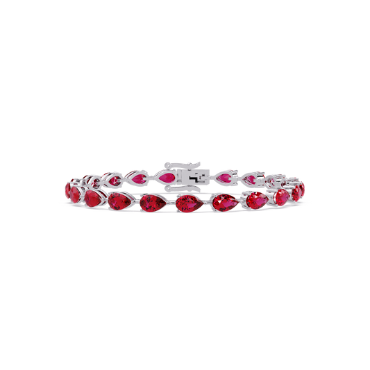 Pear-cut ruby red colorstone tennis bracelet in white gold
