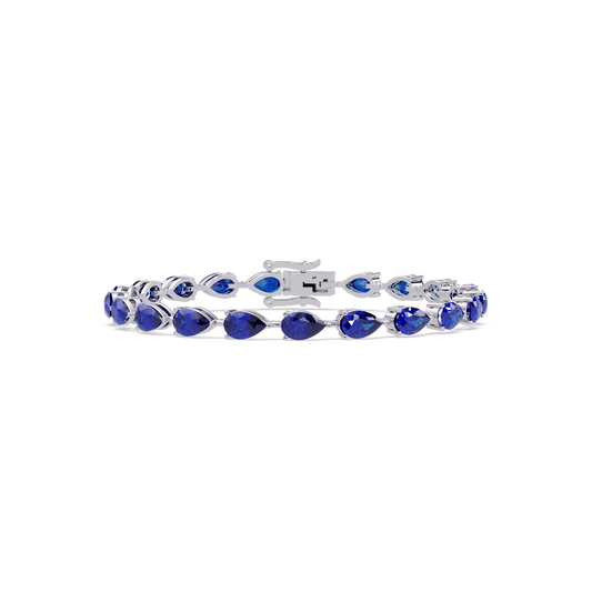 Pear-cut sapphire blue colorstone tennis bracelet in white gold