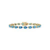 Pear-cut aquamarine blue colorstone tennis bracelet in yellow gold