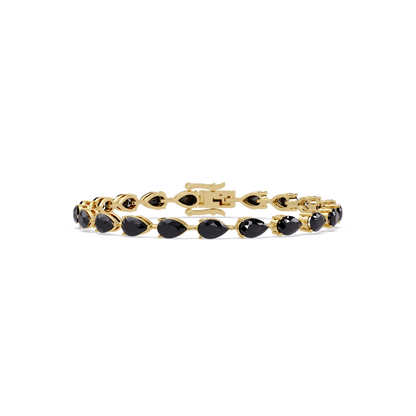 Pear-cut onyx colorstone tennis bracelet in yellow gold