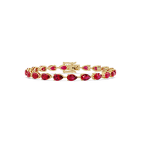 Pear-cut ruby red colorstone tennis bracelet in yellow gold
