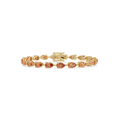 Pear-cut champagne topaz colorstone tennis bracelet in yellow gold