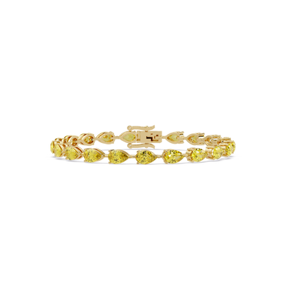 Pear-cut citrine yellow colorstone tennis bracelet in yellow gold