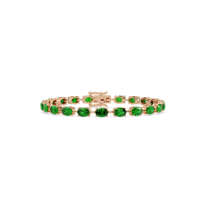 Oval-cut emerald green colorstone tennis bracelet in rose gold