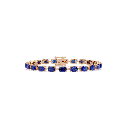 Oval-cut sapphire blue colorstone tennis bracelet in rose gold