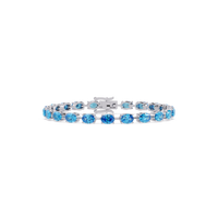 Oval-cut aquamarine blue colorstone tennis bracelet in white gold