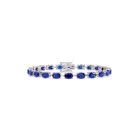 Oval-cut sapphire blue colorstone tennis bracelet in white gold
