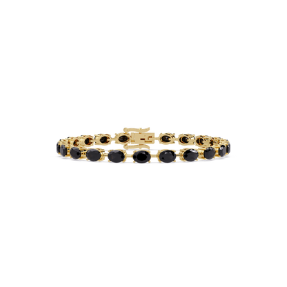 Oval-cut onyx colorstone tennis bracelet in yellow gold