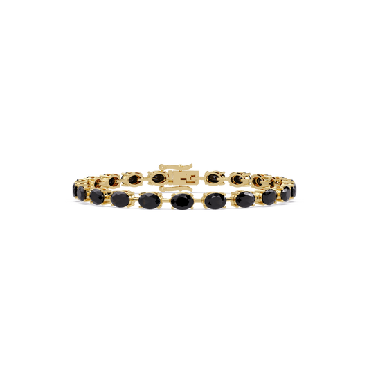 Oval-cut onyx colorstone tennis bracelet in yellow gold