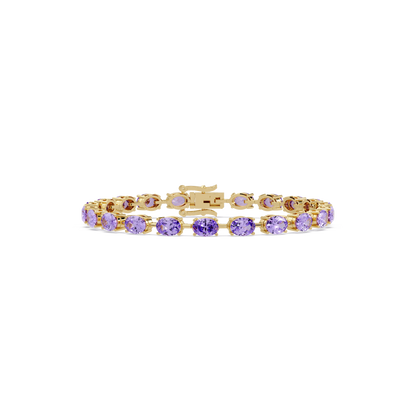 Oval-cut amethyst purple colorstone tennis bracelet in yellow gold