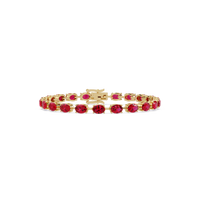 Oval-cut ruby red colorstone tennis bracelet in yellow gold