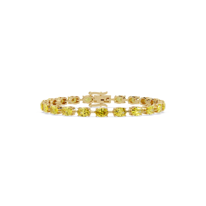 Oval-cut citrine yellow colorstone tennis bracelet in yellow gold