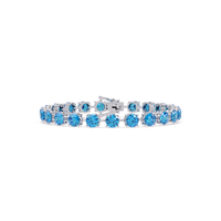 Round aquamarine blue colorstone tennis bracelet in white gold