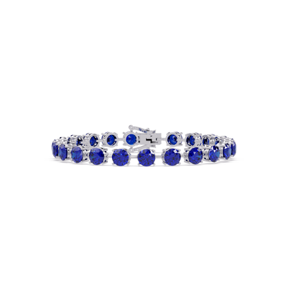 Round sapphire blue colorstone tennis bracelet in white gold