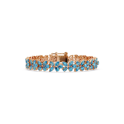 Mixed-shape aquamarine blue colorstone tennis bracelet in rose gold