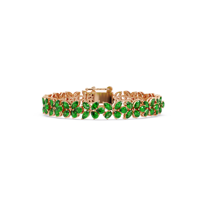 Mixed-shape emerald green colorstone tennis bracelet in rose gold