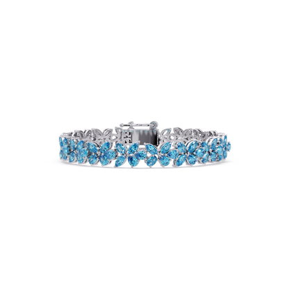 Mixed-shape aquamarine blue colorstone tennis bracelet in white gold