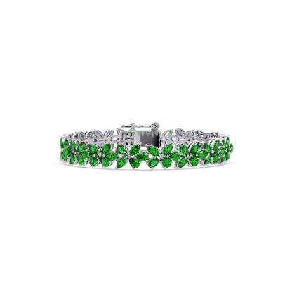 Mixed-shape emerald green colorstone tennis bracelet in white gold