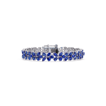 Mixed-shape sapphire blue colorstone tennis bracelet in white gold