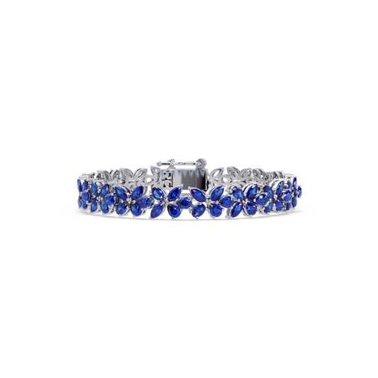Mixed-shape sapphire blue colorstone tennis bracelet in white gold