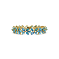 Mixed-shape aquamarine blue colorstone tennis bracelet in yellow gold