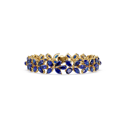 Mixed-shape sapphire blue colorstone tennis bracelet in yellow gold