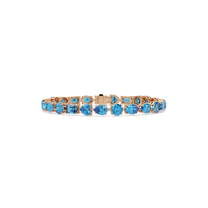 Mixed-shape aquamarine blue colorstone tennis bracelet in rose gold