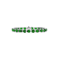 Mixed-shape emerald green colorstone tennis bracelet in white gold