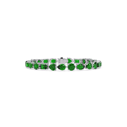 Mixed-shape emerald green colorstone tennis bracelet in white gold