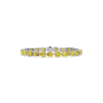 Mixed-shape citrine yellow colorstone tennis bracelet in white gold