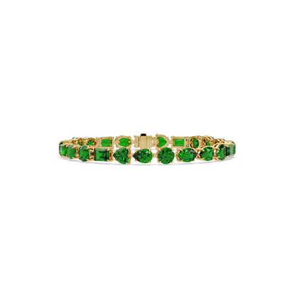 Mixed-shape emerald green colorstone tennis bracelet in yellow gold
