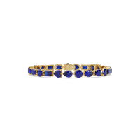 Mixed-shape sapphire blue colorstone tennis bracelet in yellow gold