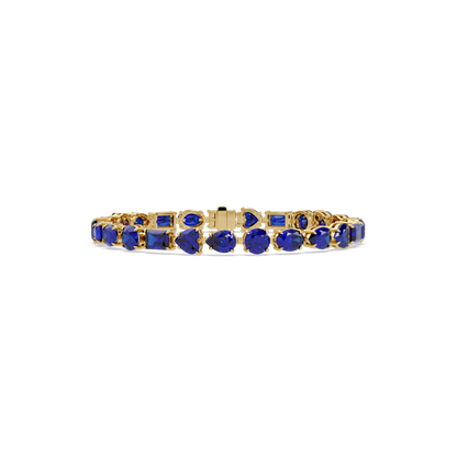 Mixed-shape sapphire blue colorstone tennis bracelet in yellow gold