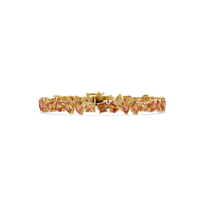 Oval, emerald, marquise, pear and round champagne topaz colorstone tennis bracelet in yellow gold