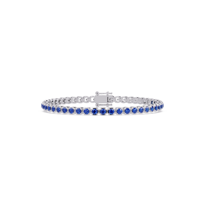 Round sapphire blue colorstone tennis bracelet in white gold