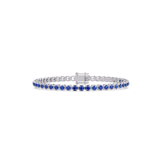 Round sapphire blue colorstone tennis bracelet in white gold