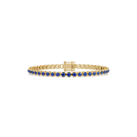 Round sapphire blue colorstone tennis bracelet in yellow gold