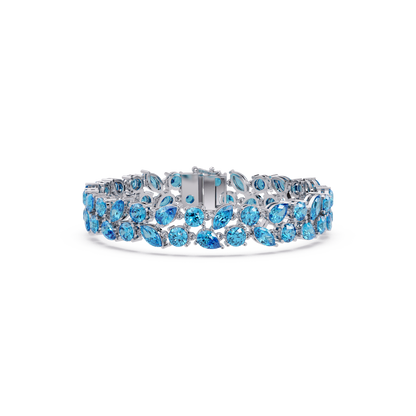 Three-row round, marquise and pear aquamarine blue colorstone tennis bracelet in white gold