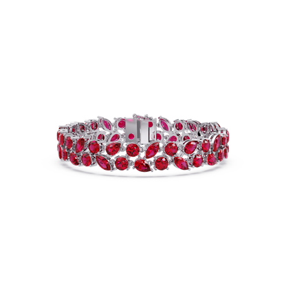 Three-row round, marquise and pear ruby red colorstone tennis bracelet in white gold