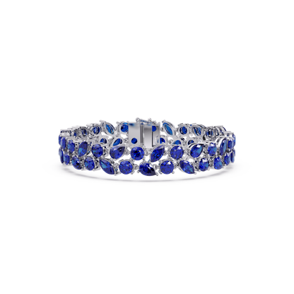Three-row round, marquise and pear sapphire blue colorstone tennis bracelet in white gold