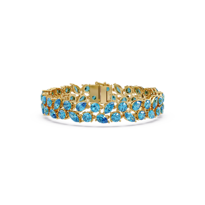 Three-row round, marquise and pear aquamarine blue colorstone tennis bracelet in yellow gold