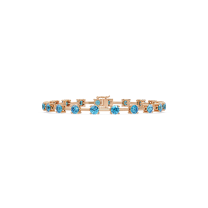 Round station aquamarine blue colorstone bracelet in rose gold