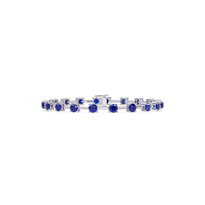Round station sapphire blue colorstone bracelet in white gold