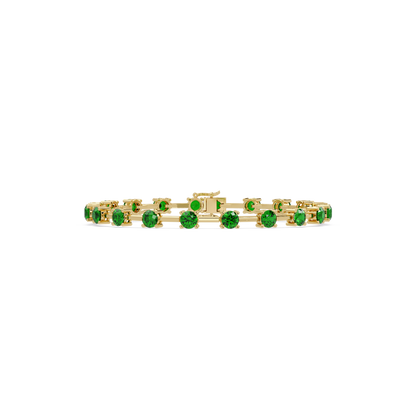 Round station emerald green colorstone bracelet in yellow gold